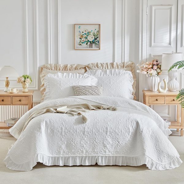 Ruffled quilted comforter set.