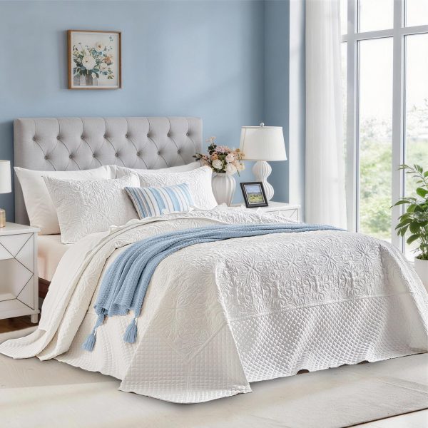 Floral-patterned white quilted comforter set