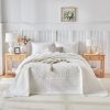 Floral-patterned white quilted comforter set