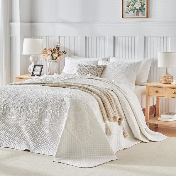 Floral-patterned white quilted comforter set