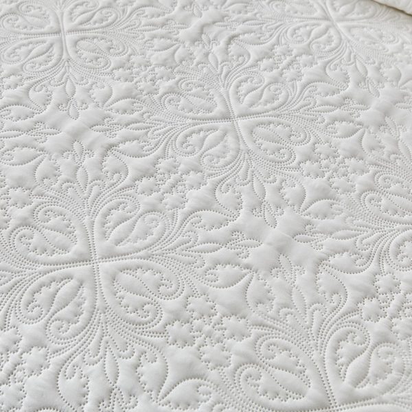 Floral-patterned white quilted comforter set